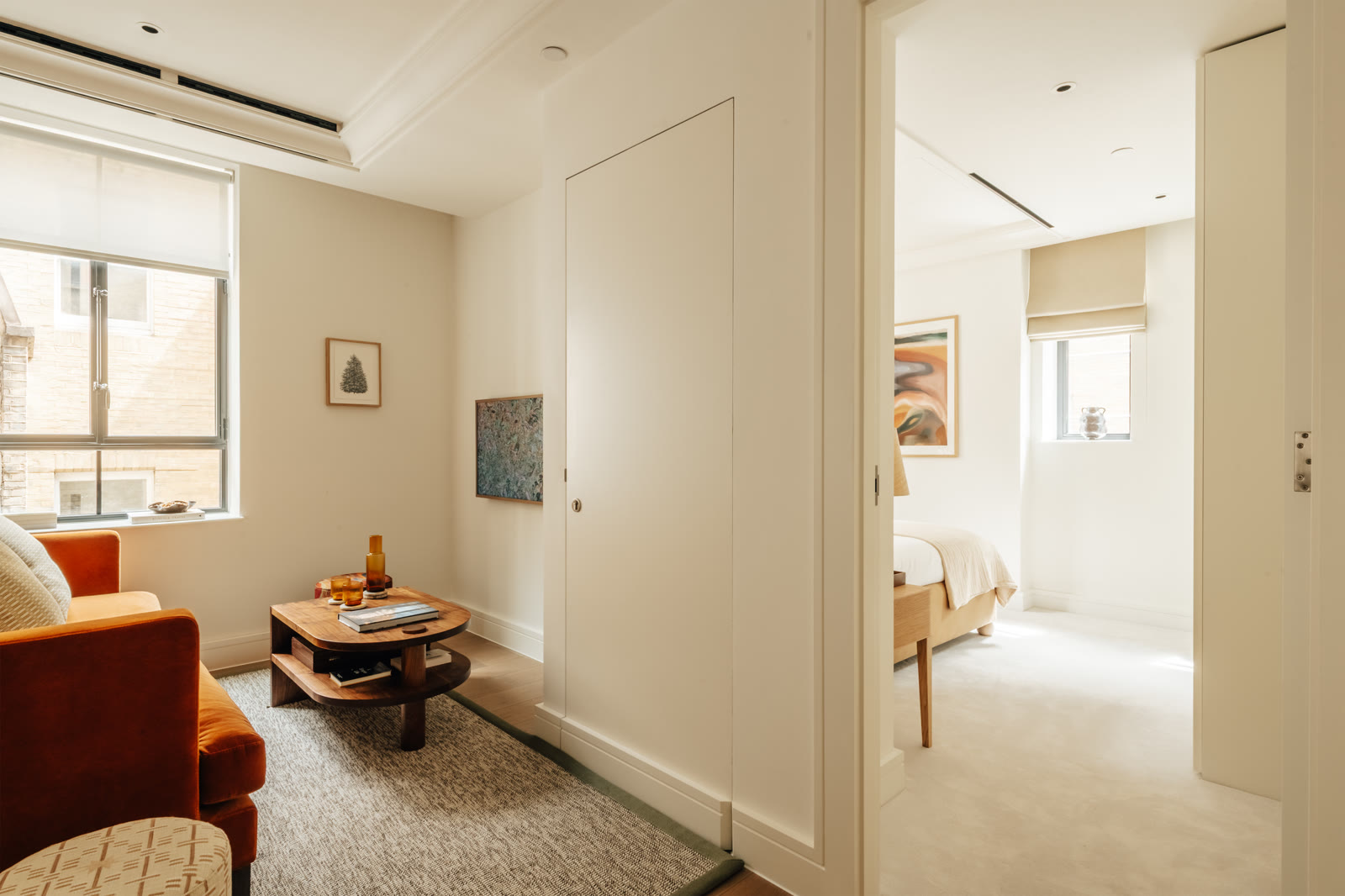 Living space looking through to the bedroom